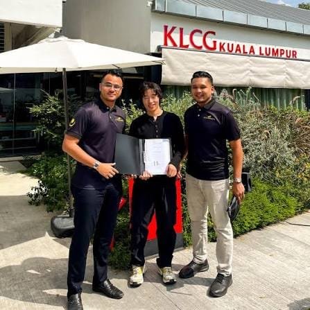 Luxamana team with the signed agreement outside the KLCG Kuala Lumpur outlet